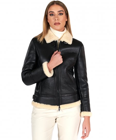 Montone shearling nero con fibbie e cerniera centrale